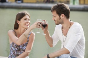 Couple toasting with wineglasses, Paris, Ile-de-France, France